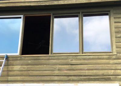 old windows in a cabin style house