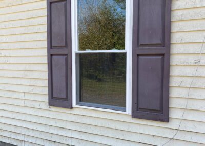 window with shutters before