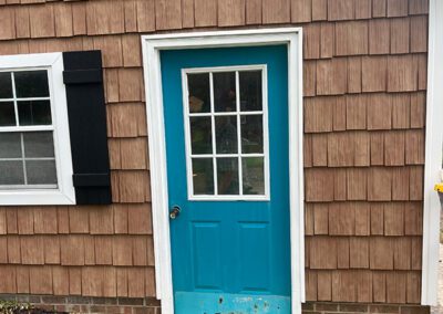 Old damaged door before replacement