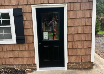 New door with window after replacement
