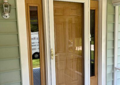 New wood door and side accents after replacement